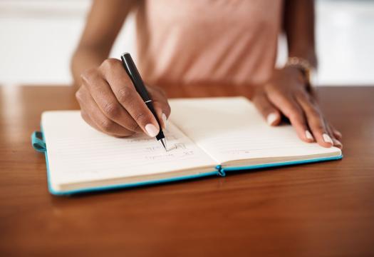Woman creating a task list