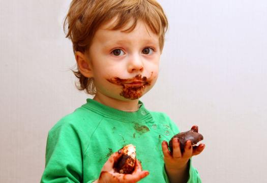 Messy Child Eating Chocolate
