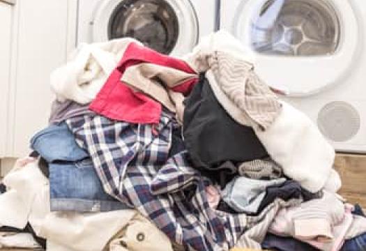 a giant pile of laundry on the floor
